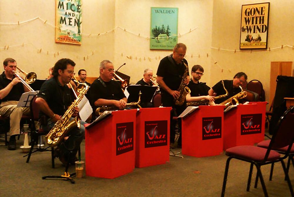 Mike Ficco taking and alto sax solo during a library concert.